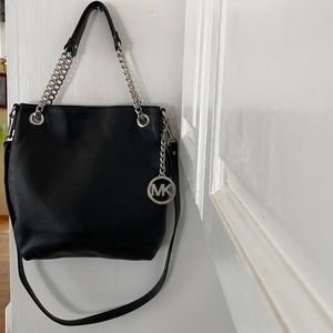 Authentic Michael Kors bag in black.